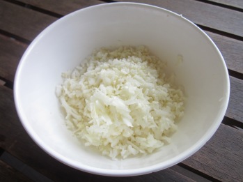 cauliflower rice recipe grated cauliflower in a bowl